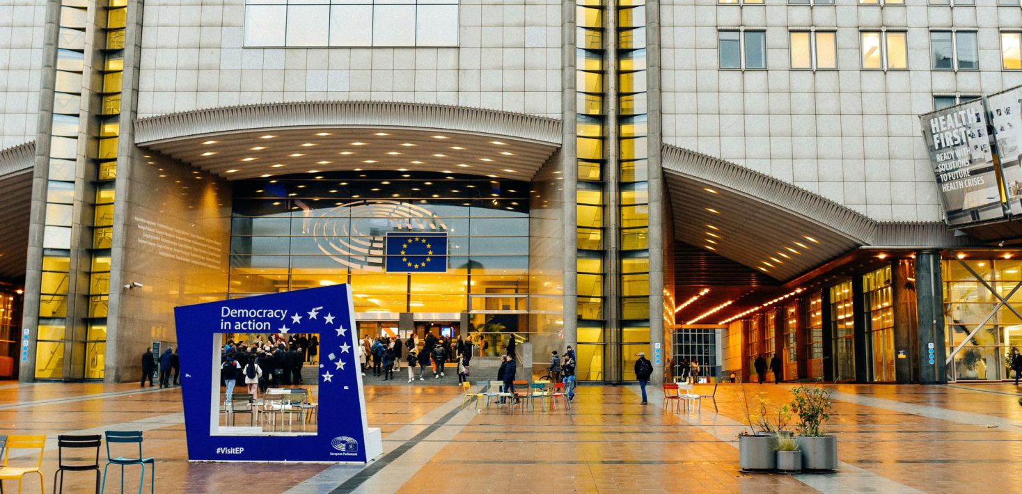 Photo of the main entrance of the European Parliament building in Brussels.